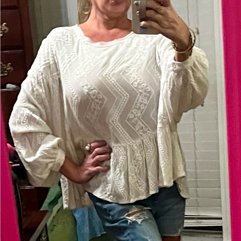 White lightweight 3/4 sleeve small blouse by Karlie. Cutout on back.